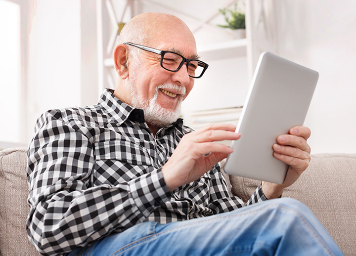 Man reading news on a tablet