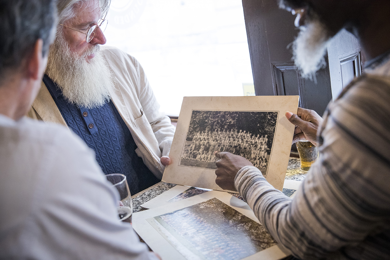 family looking at photos