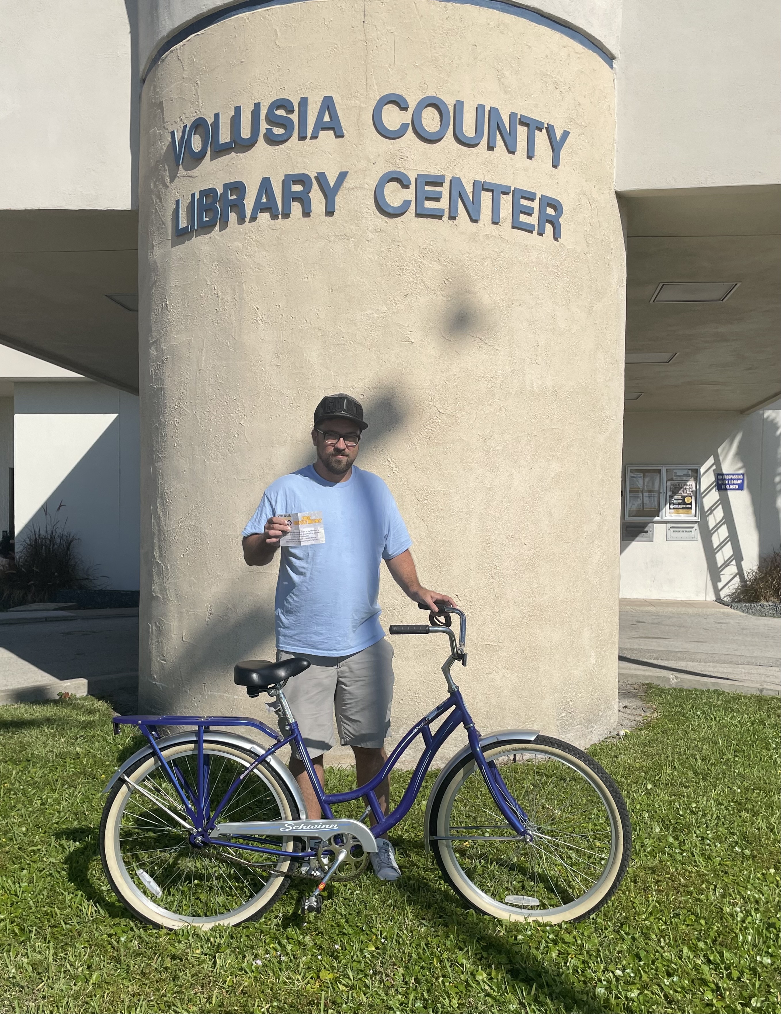 Wightman receives bike.