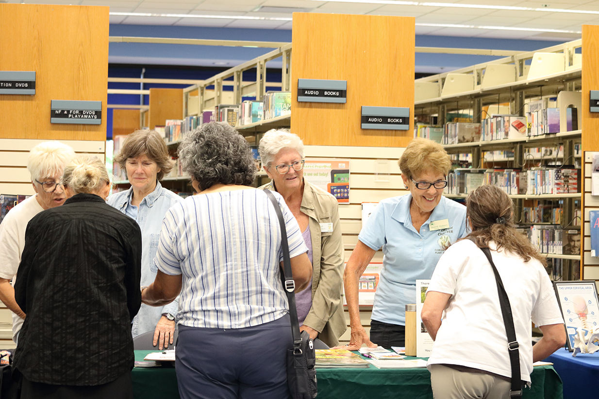 staff assisting patrons