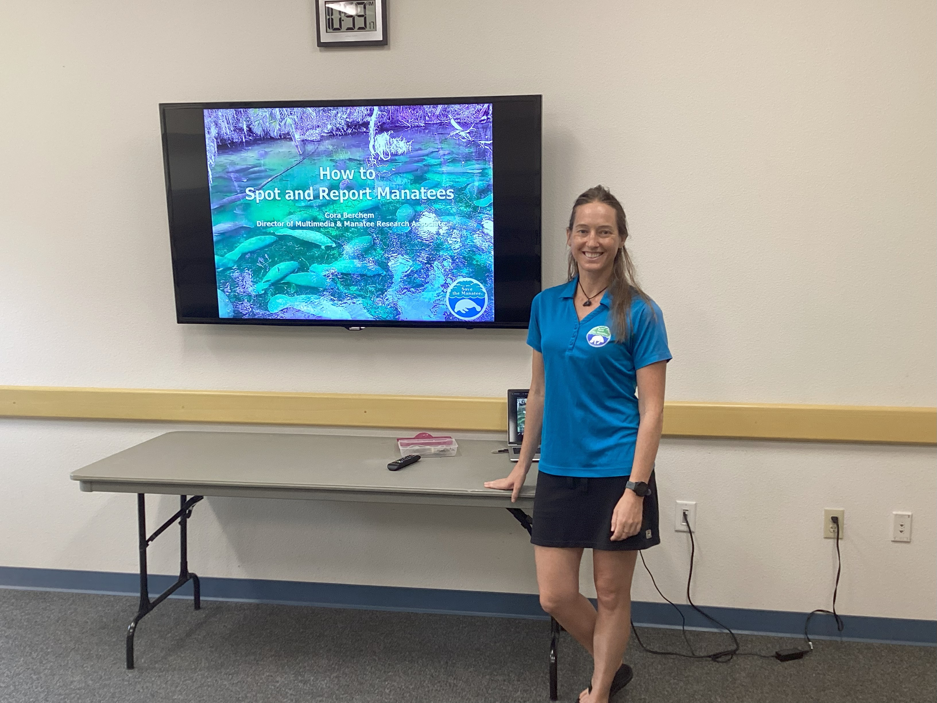 woman in front of a tv monitor
